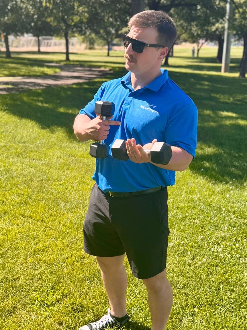 Will Miller training with dumbbells outdoors